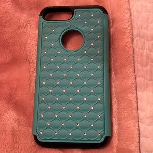 Just like my pink rhinestone. This is teal. Silicone center shockproof.